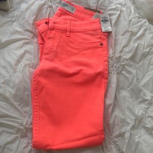 Neon orange jeans